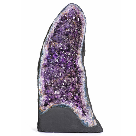 A very large cathedral amethyst geode (purple crystals).
